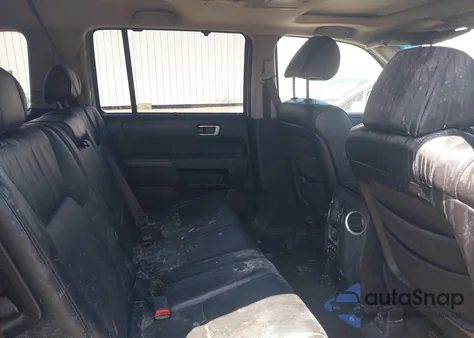 2010 Honda Pilot Touring z USA, uszkodzony, nr VIN 5FNYF4H94AB010058